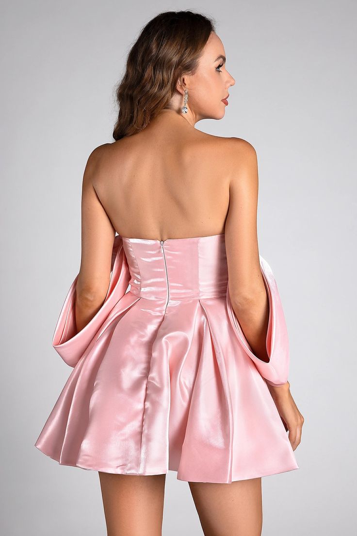 Celebrate in style with the Evelyn Pink Satin Puff Birthday Mini Dress. This playful mini dress features luxurious satin fabric and voluminous puff sleeves, creating a fun and feminine look perfect for birthdays and special occasions. The vibrant pink hue adds a touch of excitement, while the fitted bodice and flared skirt ensure a flattering silhouette. Shine and dazzle as you make unforgettable memories in this eye-catching and chic dress. Handmade customization Fabric composition: 90% polyest Evening Puff Sleeve Satin Dress With Ruffles, Puff Sleeve Taffeta Dress For Party, Chic Puff Sleeve Bubble Dress For Party, Spring Satin Mini Dress With Puff Sleeves, Pink Bubble Dress For Spring Party, Pink Taffeta Party Dress, Elegant Pink Bubble Dress For Spring, Taffeta Party Dress With Sweetheart Neckline, Party Dress With Sweetheart Neckline In Taffeta