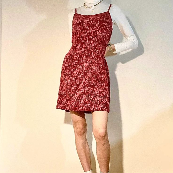 Cottagecore Grunge Fairy Earthcore Boho Aesthetic Cute Red Ditzy Cami Dress With Tie Belt Around Waist. Sold Out Brand New With Tag Still Attached! Size: One Size. Would Probably Fit Xs To M --My Measurements-- Height: 5'8" Weight: 107 Lbs Bust: 32" Waist: 24" Hip: 34.5" #Brandymelville #Floral #Ditzy #Cottage #Fairy #Cottagecore #Grunge #Earthcore #Flowers #Farmhouse #Tiewaist #Dress #Sundress #Dainty Red Fitted Mini Suspender Dress, Red Fitted Suspender Dress With Spaghetti Straps, Red Fitted Sundress With Spaghetti Straps, Casual Red Suspender Dress For Spring, Red Mini Slip Dress For Summer, Red Mini Length Slip Dress For Summer, Red Spaghetti Strap Slip Dress For Summer, Red Spaghetti Strap Sundress For Spring, Red Suspender Dress For Spring