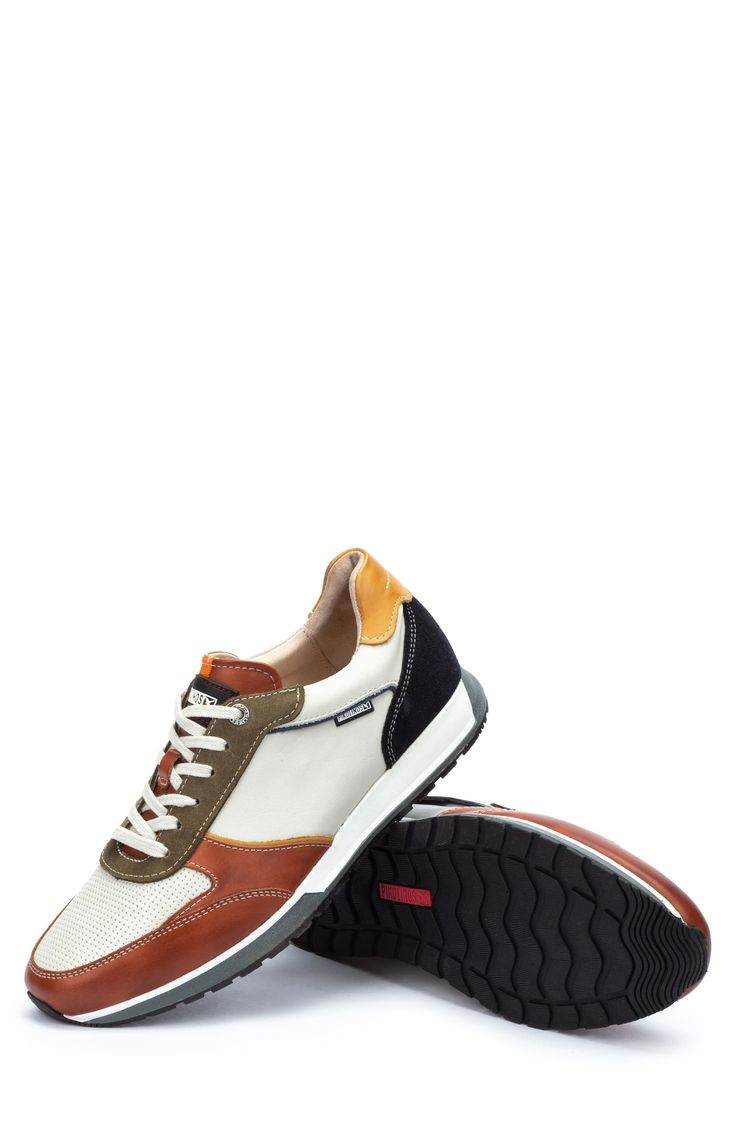 Mixed colors and textures lend visual intrigue to a sporty leather sneaker crafted for comfort. Lace-up style Removable insole Leather upper/leather and textile lining/synthetic sole Imported Leather Sneakers With Rubber Sole For Light Sports, Leather Walking Shoes With Removable Insole For Sports, Functional Leather Walking Shoes With Ortholite Insole, Functional Leather Lace-up Sneakers, Sporty Brown Sneakers With Ortholite Insole, Leather Sneakers For Light Sports With Round Toe, Sporty Leather Custom Sneakers For Sports, Leather Walking Shoes For Light Sports With White Sole, Functional Leather Walking Shoes For Light Sports