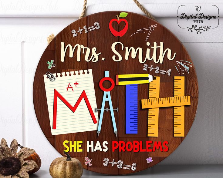 a wooden sign that says mrs smith has problems on it next to some pumpkins