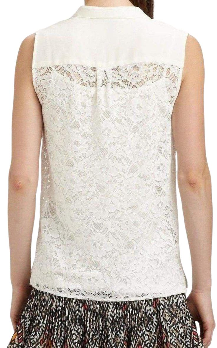 An elegant, unforgettable day or evening look with feminine appliques at the neckline. Round neck. Sleeveless. Style #: NEQ1O823Color: Off whiteMaterial: Lace: 60% nylon, 40% viscose, Contrast: 100% silkMeasurement: Approximate 24" from shoulder to longest endHand Wash.Classic fit. White Lace Tank Top For Party, Elegant White Sleeveless Top, Elegant Lace Tank Top For Spring, Chic White Lace Tank Top, Elegant Sleeveless Lace Top, White Stretch Lace Tank Top, White Feminine Sleeveless Tank Top, Elegant Sleeveless Lace Blouse For Summer, White Stretch Tank Top With Lace Detail