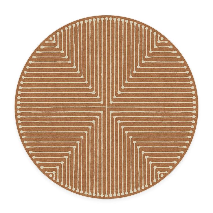 a brown and white rug with lines in the middle on a white background, it is circular