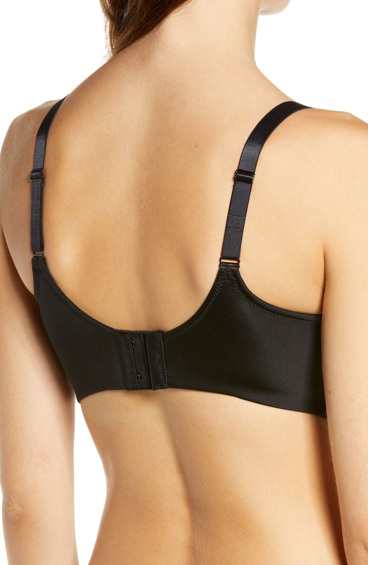 This lightweight yet powerful bra is designed to lift the bustline up to one inch while a wire-free band contours to your body so it never pinches or restrains. 55% nylon, 45% spandex Hand wash, line dry Imported Black Full Coverage Sports Bra With Built-in Bra, Full Coverage Shaping Nursing Bra With Built-in Bra, Full Coverage Shaping Nursing Bra With Padded Cups, Supportive Fitted Bra With Adjustable Straps, Shaping Full Coverage Nursing Bra With Padded Cups, Full Coverage Nursing Bra With Adjustable Straps And Shaping, Adjustable Straps Underbust Nursing Bra, Underbust Nursing Bra With Adjustable Straps, Shaping Full Coverage Nursing Bra With Adjustable Straps