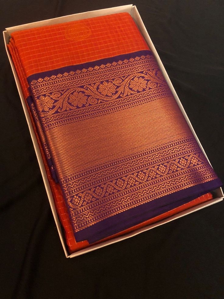 Indulge in the timeless allure of our Semi Kanjivaram Silk Saree ! Crafted with utmost care and precision, this saree exudes sheer elegance and sophistication. The lustrous semi silk fabric drapes beautifully around your body, while the intricate gold zari work adds a touch of regality. Whether you're attending a wedding or a formal dinner, this saree is sure to make heads turn.  .An unstitched blouse fabric is included. *NOTE: There might be slight differences in the colour and texture of the product due to factors such as lighting conditions, device settings, and colour correction. Classic Traditional Wear With Traditional Drape For Festive Occasions, Classic Festive Traditional Wear With Traditional Drape, Classic Diwali Traditional Wear With Zari Work, Classic Traditional Wear With Pallu For Festive Season, Classic Saree With Zari Work For Festive Occasions, Classic Festive Saree With Zari Work, Classic Festive Zari Work Saree, Classic Traditional Wear With Pallu For Festivals, Classic Saree With Pallu In Traditional Drape