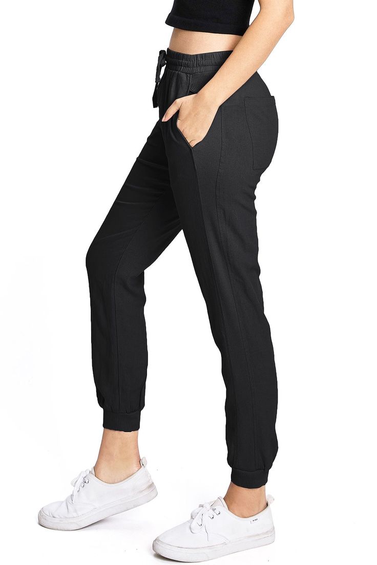 Light weight linen jogger pants with a high rise fit, a stretchy smocked waist and a drawstring tie. Pockets on the front and back. CARE | Machine Wash Cold CONTENTS | 55% Linen 45% Viscose MEASUREMENTS | 35"/89 cm Top to Bottom 25"/64 cm Inseam 10"/25 cm Rise (Size Small) MODEL | 5'8 - wearing a size Small IMPORTED Back Care, Linen Joggers, Jogger Pants, Smocking, Capri Pants, High Rise, Sweatpants, Size Small, Pants