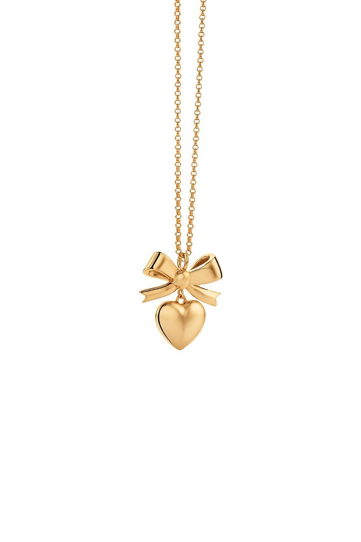 Superlove Bow Necklace Gold Karen Walker’s Superlove Bow Necklace features the brand’s favourite heart, elevated with a Victorian locket profile and delicately suspended from a mini bow.  - Charm Length - 21 mm   - Charm Width - 20 mm   - Necklace Length - 55cm Gold Bow Necklace, Victorian Locket, Bow Charm, Mini Bow, Bow Necklace, Mini Bows, Karen Walker, Necklace Length, Necklace Gold