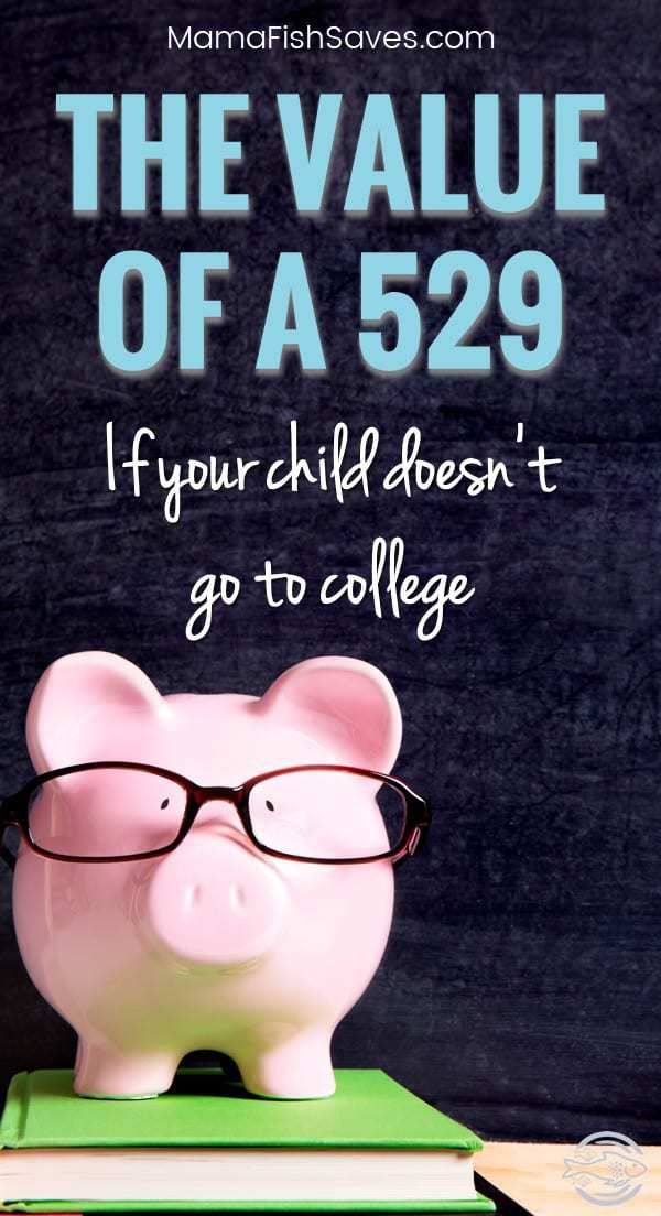 a pink piggy bank sitting on top of a desk next to a pile of books