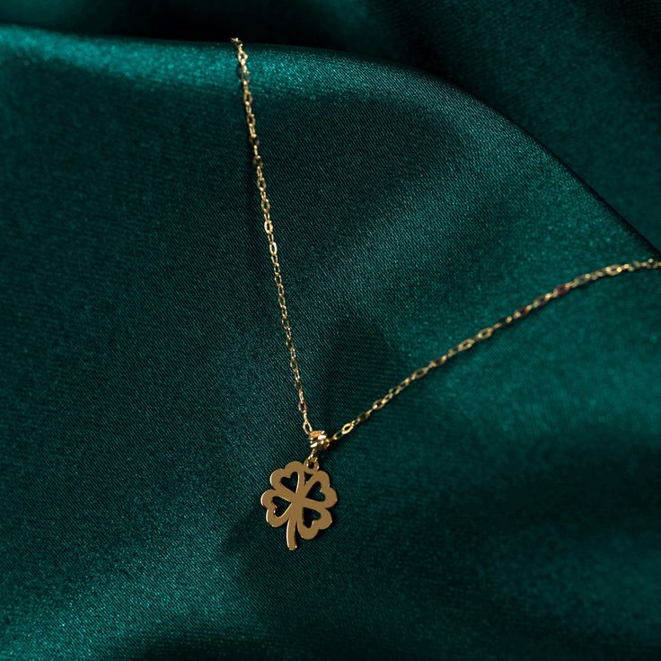 "FOUR LEAF CLOVER NECKLACE - 14K GOLD CLOVER NECKLACE FOR WOMAN ❤️ ITEM DETAILS Material: 14K Solid GOLD (Not Filled or Plated). Gold Necklace Chain Length: 16,7\" inch (42,5cm) Main Chain and 1\" inch (2,5cm) Adjustable Chain Part Total: 17,7\" inch (45cm) Chain Width: 1mm Finish: 14K Yellow Gold Featuring: 8,5x11mm Clover Pendant Stone: Zircon ♥ SHIPPING We work with Dhl Express for worldwide shipping. Please leave your phone number at checkout for delivery purposes. Production time: 3-5 busin Gold Clavicle Chain Charm Necklace In Fine Jewelry Style, Yellow Gold Pendant Charm Necklace With Clavicle Chain, Yellow Gold Pendant Charm Necklace, 14k Gold Clavicle Chain With Round Pendant, Yellow Gold Clavicle Chain Pendant Necklace, Gold 14k Collar Necklace, 14k Gold Necklace With Delicate Chain Pendant, 14k Gold Pendant Necklace With Delicate Chain, Dainty 14k Gold Pendant Necklace