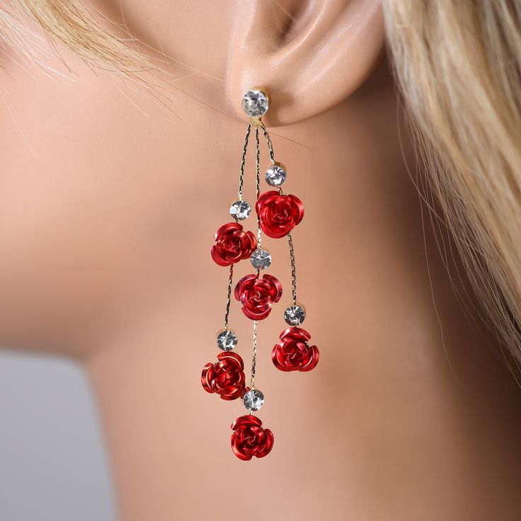 New to our Millennium collection. This beautiful romantic Earrings handmade with fine quality of Rhinestones and beautifully made Red Metallic rose flowers  for your special day. Even we have hard time taking pictures because of their shine 😄 so we want to shine our brides on their special days. The material used in these earrings are free from Lead, Nickel, Cadmium so it will not give you any skin irritation and environment friendly too.. Earrings measure about 2.75 inches long and 1 inches wi Party Jewelry With Rose Design In Rose Red, Rose Red Jewelry With Rose Design For Party, Party Flower Drop Earrings With Rose Design, Party Rose Design Drop Flower Earrings, Party Rose Design Flower Drop Earrings, Flower Shaped Rose Design Party Earrings, Rose Flower Drop Earrings For Party, Rose-colored Flower Earrings For Valentine's Day, Rose Flower Earrings For Wedding On Valentine's Day