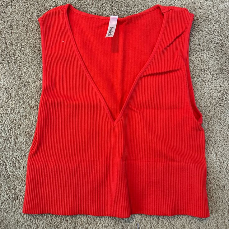 Never Worn Without Tags Cropped Ribbed Tank Top Trendy Red Seamless Tops, Red Seamless Top For Spring, Red Ribbed Top For Summer, Red Seamless Tank Top For Spring, Red Ribbed Crop Top For Summer, Red Ribbed Summer Top, Ribbed V-neck Top For Beach, Red V-neck Crop Top For Spring, Red Ribbed Fitted Crop Top