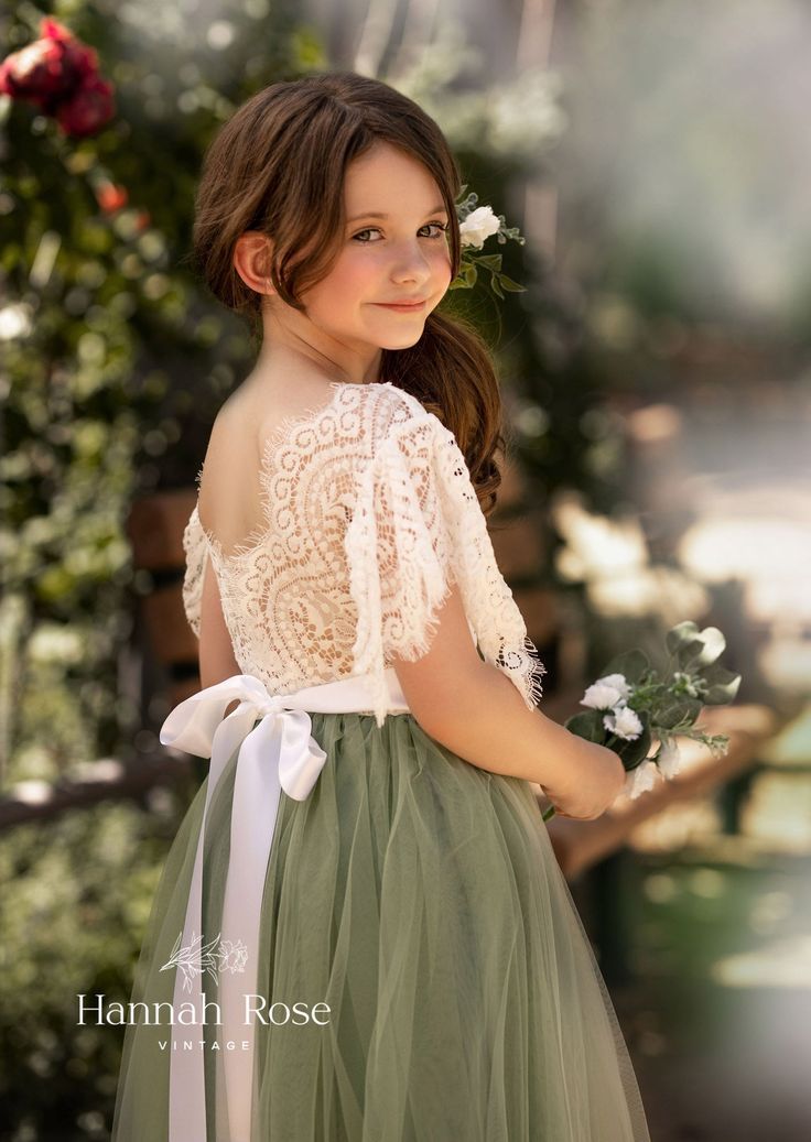 ALL FLOWER GIRL DRESSES 10% OFF - USE CODE: FLOWERGIRL10 😍 FREE SHIPPING ON ALL ORDERS $100 UP The perfect fairytale wedding flower girl dress. This pretty whimsical style Boho Sage Green Flower Girl dress features a soft stretch lace bodice and a feathered lace V-back with a full length tulle skirt. Dress is lined and perfect for your flower girl dress, communion dress, baptism dress, birthday dress or special occasion. Beautiful for photoshoots and portraits. 👉😍🌈 Please include sash color Sage Green Flower Girl Dress, Green Flower Girl Dress, Full Length Tulle Skirt, Green Flower Girl Dresses, Burgundy Flower Girl Dress, Vintage Flower Girls, Sage Green Flowers, Flower Girl Dresses Vintage, Tulle Skirt Dress