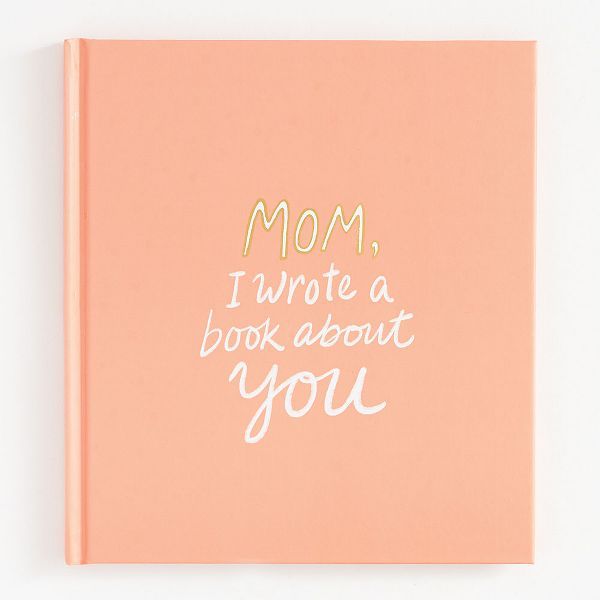 a pink book with the words mom, i wrote a book about you on it