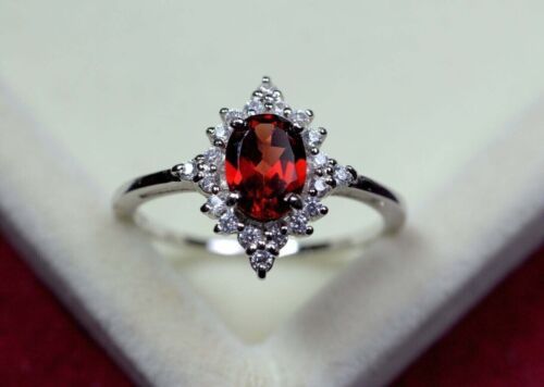 (eBay) Find many great new & used options and get the best deals for 1.50Ct Oval Cut Simulated Ruby Halo Engagement Ring 14K White Gold Plated at the best online prices at eBay! Free shipping for many products! Garnet Wedding Rings Silver, Antique Garnet Ring, Red Engagement Ring, Garnet Wedding Rings, Ruby Wedding Rings, Garnet Wedding, Garnet Ring Silver, January Birthstone Rings, Sterling Silver Garnet Ring