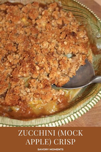 a close up of a pie on a plate with a spoon in it and the words zucchini mock apple crisp