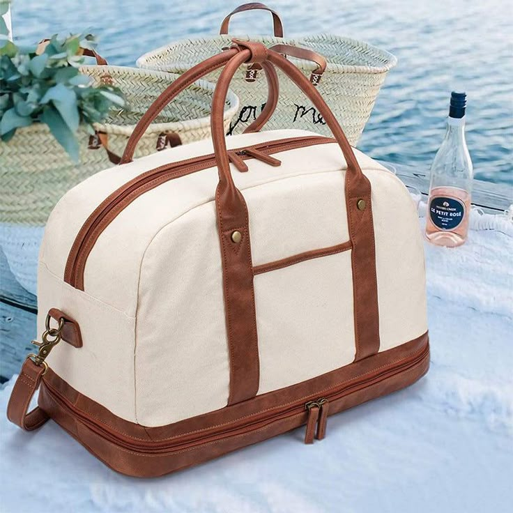 Canvas Duffle Bag Women Waterproof Canvas Overnight Bag Weekender Bag With Shoes Compartment Model Number: OMS50107 Dimensions: 19"L x 9.5"W x 13"H / 48 cm(L) x 24 cm(W) x 33 cm(H) Weight: 2.2 lb / 1 kg Hardware: Selected Hardware Shoulder Strap: Adjustable & Removable Color: Beige Features: • Selected Canvas and PU Leather• Inside 1 Cell Pocket, 1 Wallet Pocket, 1 Zipper Pocket.• YKK Zipper• Adjustable Shoulder Strap• Can fit a 15.6'' Laptop. Carryon Bag, Perfect Travel Bag, Canvas Duffle Bag, Overnight Travel Bag, Large Travel Bag, Leather Duffle Bag, Travel Bags For Women, Travel Tote Bag, Leather Duffle