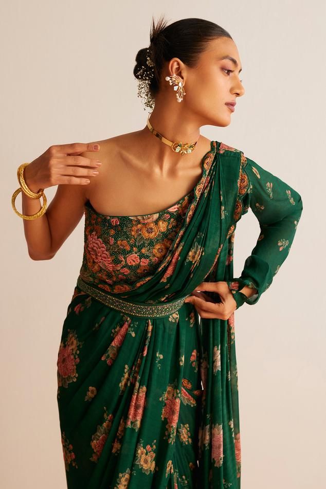 Bottle green pre-draped saree with floral print and scallop embroidered border. Paired with one shoulder-printed padded blouse and belt. - Aza Fashions Green Draped Georgette Dress, Green Traditional Drape Evening Dress, Green Evening Dress With Traditional Drape, Green Wedding Dress With Draped Sleeves, Traditional Drape Green Georgette Dress, Festive Green Draped Dresses, Green Silk Saree Dress, Green Designer Wear Pre-draped Saree, Green Dress With Traditional Drape