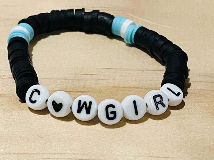 Teal and Black Cowgirl Bracelet  4$ Cowgirl Bracelets, Black Cowgirl, Clay Bead Bracelet, Clay Bead, Clay Beads, Bead Bracelet, Arm Band, Jewelry Bracelets, Beaded Bracelets