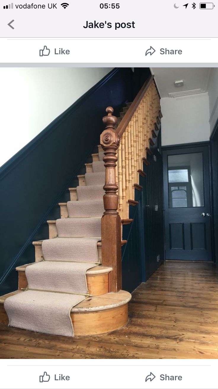 the stairs in this house have been painted blue and are being used as a postcard