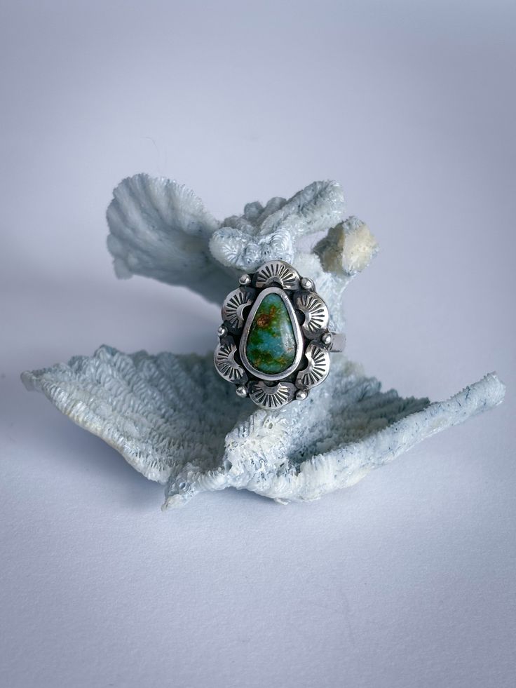 Embrace your inner glow! This ring is crafted for the soul-driven woman who isn’t afraid to shine. Hand-fabricated with care, this sterling silver ring features a captivating Sonoran Gold Turquoise centerpiece with a striking green hue and dashes of golden matrix and flakes. The stone is cradled by hand-stamped and forged sun rays, a nod to the radiant energy you bring to every room. The ring's dimensional design is finished with a darkened patina for depth, accented by handmade silver beads, an Polished Chrysoprase Ring Jewelry, Unique Untreated Turquoise Ring, Fine Jewelry Chrysoprase Ring, Spiritual Turquoise Ring, Bohemian Turquoise Ring As Gift With Polished Finish, Spiritual Turquoise Ring In Sterling Silver, Bohemian Turquoise Sterling Silver Ring With Polished Finish, Spiritual Sterling Silver Turquoise Ring, Spiritual Sterling Silver Turquoise Gemstone Ring