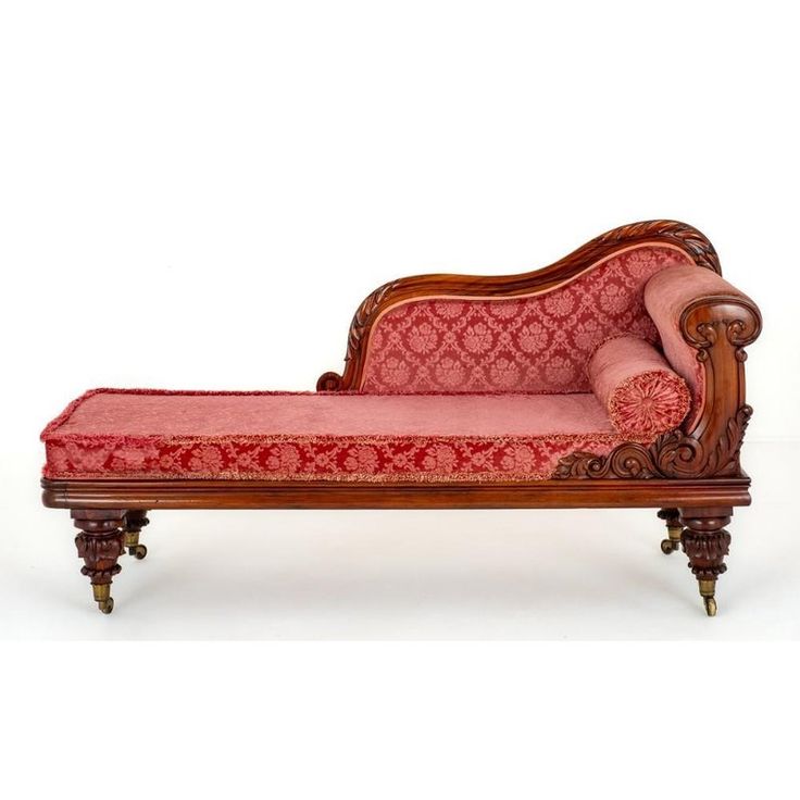 an antique style chaise lounge with pink upholstered fabric