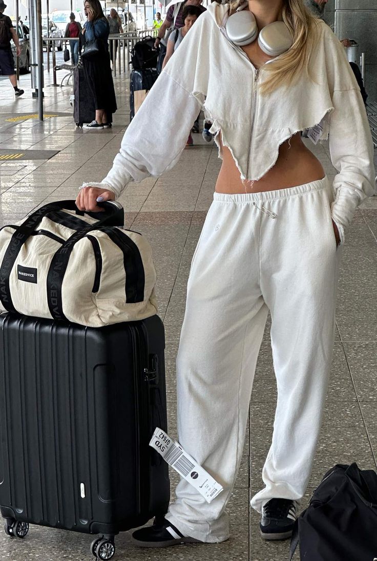 The Serena by Nakedvice is a duffle bag crafted from smooth crushed nylon. Featuring two large top handles and zip closure, The Serena is the perfect travel and overnight bag. Colour: IVORY White Travel Bag With Luggage Sleeve For Weekend Trips, White Casual Duffle Bag For Weekend Trips, Casual White Duffle Bag For Weekend Trips, Trendy White Travel Bag, Beige Duffle Bag For Weekend Trips, Casual White Travel Bag For Overnight Trips, White Travel Bag For Weekend Trips With Zipper, White Weekender Bag For Weekend Trips, White Duffle Bag For Overnight Trips With Zipper