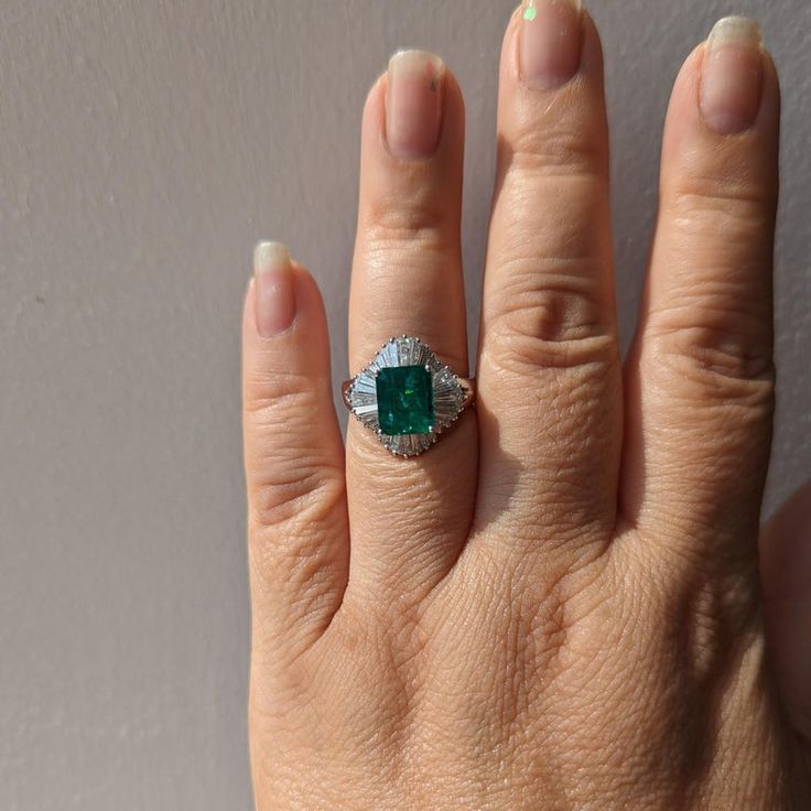 Gorgeous 2.97 ct. emerald octagon with 1.55 ct. good quality white diamond baguettes.  Handmade in platinum.  Ring size 8.  Metal: Platinum Stone: White Diamond,Emerald Stone Cut: Emerald Cut  Dimensions reference the ring size and are not specific to the ring itself. Exact ring dimensions are not provided. Please reach in the seller Q&A for questions. Platinum Octagon Baguette Diamond Jewelry, Emerald Ring With Baguette Diamonds In Fine Jewelry Style, Emerald Ring With Baguette Diamonds Fine Jewelry, Octagon White Gold Emerald Ring With Brilliant Cut, Octagon Emerald Ring In White Gold With Diamond, White Gold Emerald Ring With Baguette Diamonds, Octagon Shaped Emerald Ring In White Gold, White Gold Octagon Emerald Ring With Brilliant Cut, White Gold Octagon Emerald Ring With Diamonds