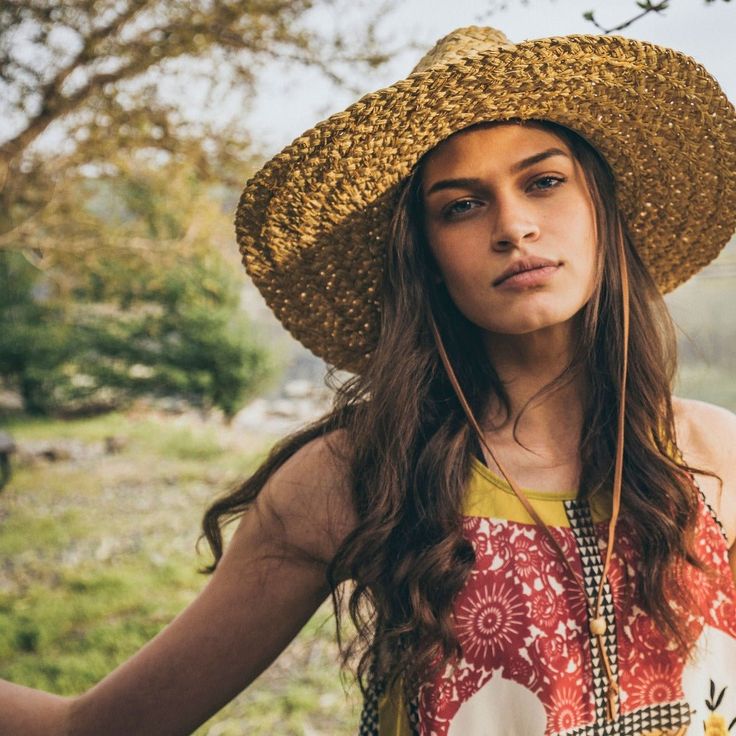 The Skiff is big on texture. Two tones of braided raffia combine to create a look that's highly three-dimensional (but not stiff or heavy). This women's handmade sun hat is finished with a chin cord. Full brim provides sun protection Heavy, braided texture with contrast stitching; Faux suede hatband Adjustable chin cord with bead helps keep hat in place Raffia straw Brim length: 8.5 cm Soft interior band for comfort Handmade; One size; Women's-specific fit; Imported Bohemian Fedora Straw Hat For Warm Weather, Bohemian Fedora Panama Hat For Warm Weather, Bohemian Straw Hat For Warm Weather, Bohemian Brimmed Straw Hat For Warm Weather, Bohemian Crochet Hat With Curved Brim For Warm Weather, Braided Straw Hat For Summer, Bohemian Adjustable Crochet Hat For Warm Weather, Woven Sun Hat For Summer, Adjustable Bohemian Crochet Hat