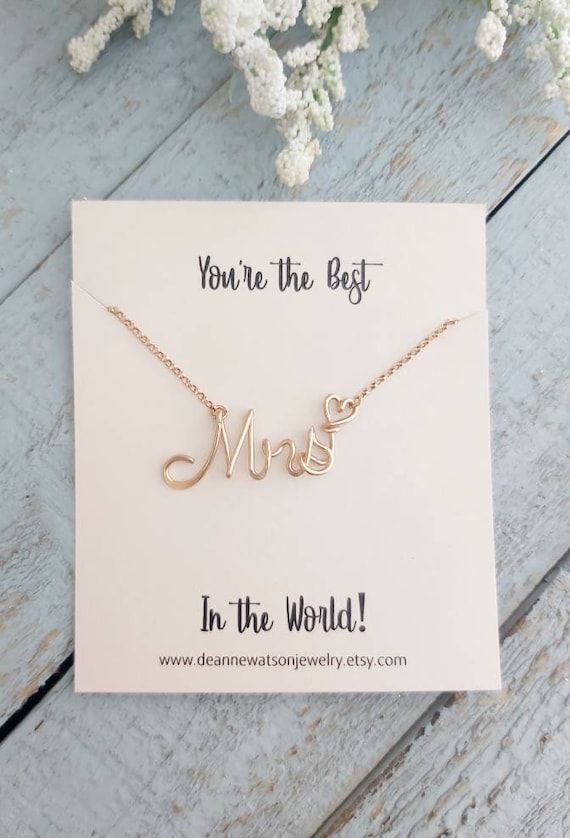 Show your wife just how much she means to you with this handcrafted cursive name necklace.We don't just create gorgeous handcrafted necklaces, we create moments, memories and smiles!Personalize this "Mrs" necklace with any name or word of your choice up to 10 letters. Available metals:Silver plated Sterling silver 14k gold filledRose filled gold CopperDainty 1.2mm chain available from 14 to 20 inches.Handcrafted, durable and sturdy.Comes ready for gift giving in a cute jewelry box!Available with Rose Gold Name Necklace For Wedding Gift, Minimalist Name Necklace For Valentine's Day Wedding, Minimalist Name Necklace For Wedding On Valentine's Day, Minimalist Name Necklace For Wedding And Mother's Day, Minimalist Name Necklace For Wedding On Mother's Day, Rose Gold Name Necklace For Wedding, Custom Name Necklace For Mother's Day Wedding Gift, Mother's Day Wedding Gift Custom Name Necklace, Mother's Day Wedding Gift Jewelry With Custom Name