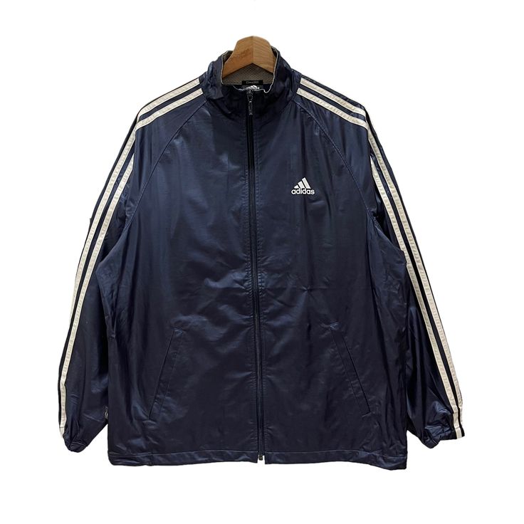 PLEASE ASK ANY QUESTION BEFORE BUYING  THIS IS USED CLOTHING PLEASE DON'T EXPECTED IT TO BE LIKE NEW OR IN PRISTINE  CONDITIONS!!  Vintage ADIDAS Clima 365 Waterproof Zipper Jacket  Tag Adidas Material Nylon  Size on tag M Measures About (Approximately)  -Armpit to Ampit : 23.5 inch  -Length (back collar down) : 28 inch -Shoulders : 18 inch  -Sleeve Length : 25 inch Condition : used good condition  9/10 **No Tears, No Stains And No Holes** PLEASE READ THE DESCRIPTION AND POLICY BEFORE BUYING ACC Waterproof Nylon Track Jacket Sportswear, Waterproof Nylon Track Jacket, Sporty Windbreaker With Three Stripes Branding For Sports, Sporty Windbreaker With Three Stripes Branding, Technical Windproof Windbreaker For Sports, Adidas Logo Outerwear For Outdoor Sports Season, Adidas Track Jacket For Outdoor Sports Season, Hooded Adidas Windbreaker For Outdoor Activities, Sporty Adidas Windbreaker For Outdoor