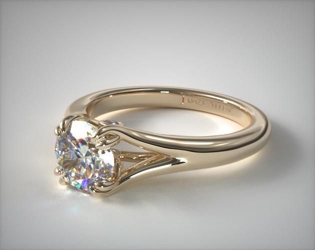 a close up view of a ring with a diamond on it's shants