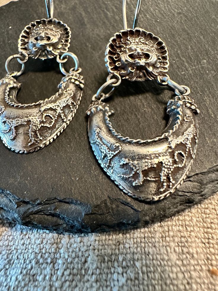 "Vintage Italian drop earrings, sterling, Ancient Greek or Roman revival design.  Condition I see no problems-photos show the details.  Size approx 2\", wt.- 9.4 grams.  As with most Italian jewelry it is interesting, well designed, and finely made, signed of back with AR , 925.  Ancient inspiration1" Victorian Silver Earrings For Ceremonial Occasions, Victorian Silver Ceremonial Earrings, Vintage Sterling Silver Earrings For Ceremonial Occasions, Ornate Sterling Silver Plug Earrings, Ornate Silver Plug Earrings, Ornate Engraved Sterling Silver Earrings, Mafia Jewelry, Ancient Roman Jewelry, Revival Design