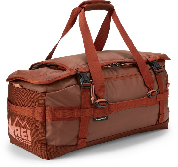 The perfect size for a weekend away—and small enough to carry on the plane—the REI Co-op Big Haul 40-liter duffel easily switches between duffel and backpack mode with its stowable shoulder straps. Functional Brown Duffle Bag For Trip, Brown Functional Duffle Bag For Trip, Brown Duffle Bag With Pockets For Outdoor Activities, Rectangular Luggage With Functional Pockets For Outdoor Activities, Nylon Duffle Bag With Pockets For Trips, Outdoor Rectangular Luggage With Functional Pockets, Rectangular Outdoor Luggage With Functional Pockets, Functional Luggage For Outdoor Activities, Functional Luggage With Pockets For Weekend Trips