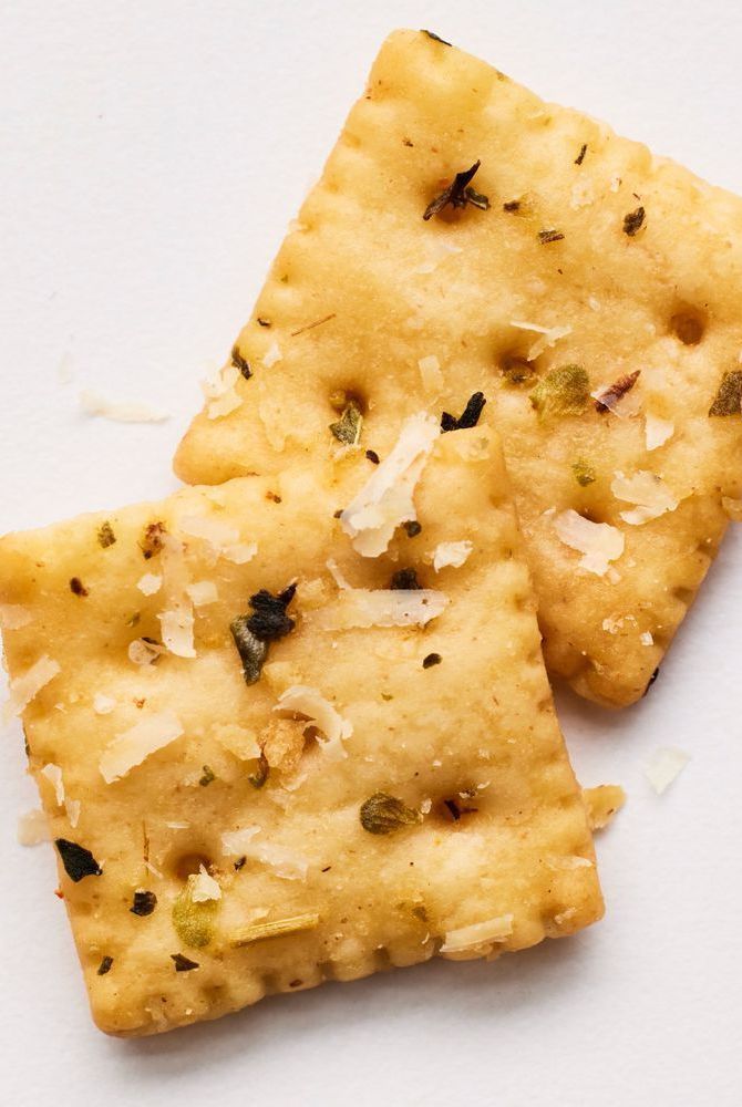 two pieces of crackers sitting on top of each other