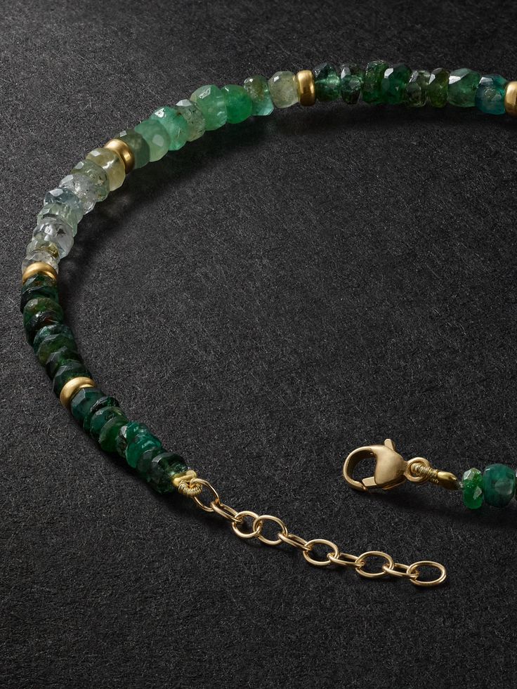 JIA JIA's symbolic stones are carefully chosen for their unique characteristics. This handmade bracelet is strung with faceted emeralds, believed to represent eternal life and wisdom. It adjusts via the gold clasp. Emerald Rondelle Faceted Beads Jewelry, Faceted Emerald Rondelle Jewelry, Spiritual Emerald Jewelry With Round Beads, Faceted Emerald Beads Jewelry, Faceted Emerald Round Beads Jewelry, Hand-strung Emerald Jewelry As A Gift, Hand-strung Emerald Jewelry For Gifts, Hand-strung Emerald Jewelry Gift, Hand-strung May Birthstone Spiritual Jewelry