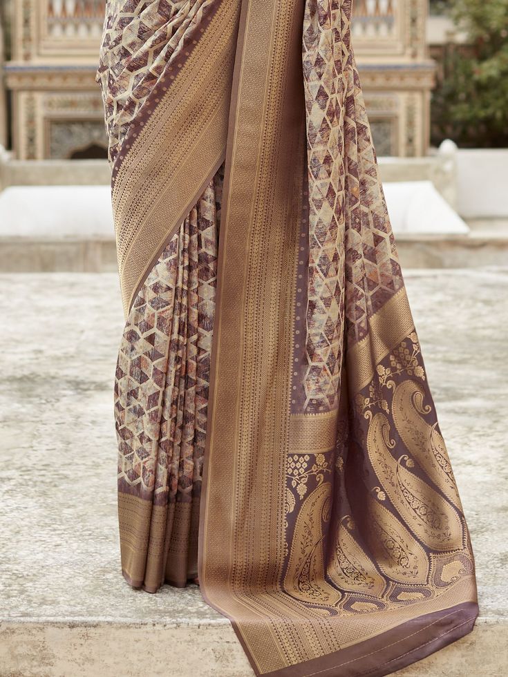 Memorialize your upcoming festivals, events, and any occasion with this stunning brown printed tissue silk saree with a blouse. The saree features intricate digital print work and zari weaving border work, giving it an elegant and ethnic look. The set includes a similar color silk blouse with print work that complements the saree perfectly.
The saree measures 5.50 meters in length and comes with unstitched blouse material, allowing you to customize it to your size. The lightweight fabric and com Brown Silk Blouse, Red Silk Saree, Lehenga Crop Top, Tissue Silk Saree, Reception Sarees, Grey Saree, Golden Saree, Maroon Saree, Bollywood Lehenga