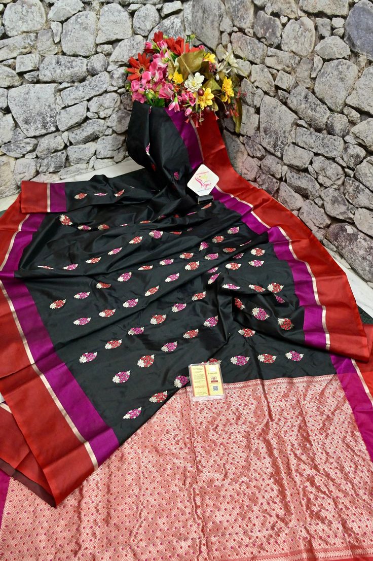 Get the move with our greatest party-time collection, available in black with full-body having traditional meenakari work and on the pallu and the border having filigree style traditional zari weaving on the border work, making this silk mark a must-buy. Buy this collection only with us. Color: A shade of black color Technique: Amazing work of golden zari and meenakari buti work on the body with traditional meenakari weaving border and pallu Fabric: Katan Silk Quality: Indyvogue's Assurance of P Katan Silk Saree Banarasi, Silk Saree Banarasi, Saree Banarasi, Katan Silk Saree, Work Online, Color Techniques, Katan Silk, Banarasi Saree, Zari Work