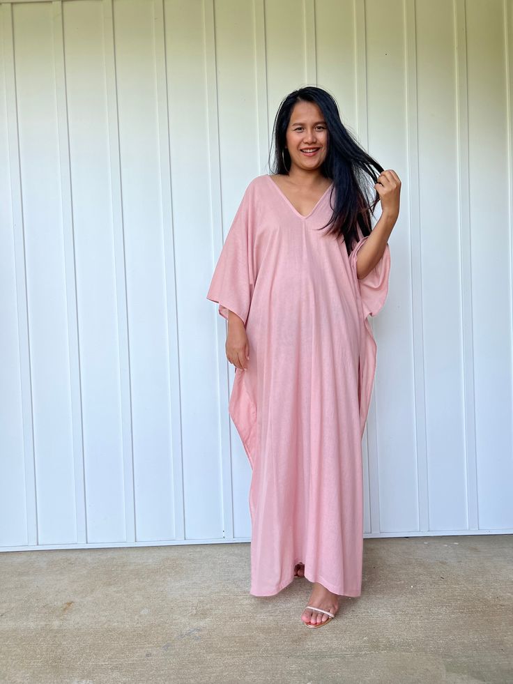 Unwind in absolute comfort with our semi sheer cotton gauze kaftan. This kaftan is perfect for the beach, pool, resort and laid-back time at home. Crafted from quality soft and breathable gauze cotton, it offers an airy fit that's ideal for lounging and cover up. Its relaxed design and easy slip-on style make it your go-to choice for outdoor cover up and relaxed nights at home. V-neck Maxi Dress For Beach Season Loungewear, Relaxed Fit V-neck Cover-up For Vacation, Oversized V-neck Maxi Dress For Vacation, Summer V-neck Unlined Cover-up, Flowy V-neck Tunic For Beach Cover-up, Oversized V-neck Tunic For Beach Cover-up, Relaxed Fit V-neck Beach Dress For Vacation, Flowy V-neck Breezy Cover-up, Oversized V-neck Beachwear Cover-up