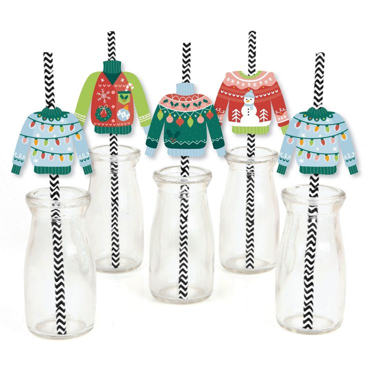 six glass jars with sweaters and drinking straws in front of each other on a white background