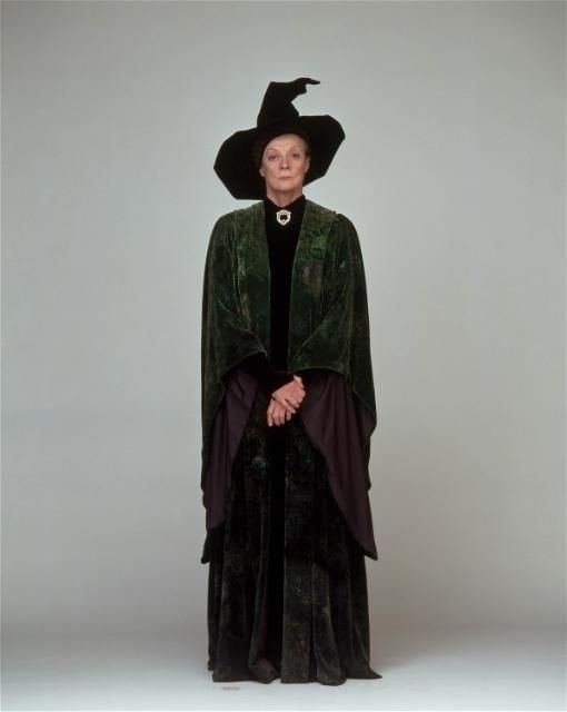 an older woman wearing a witch costume