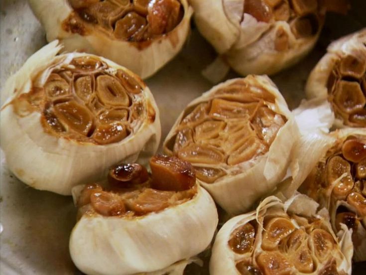 some kind of food that is on a pan and ready to be cooked in the oven