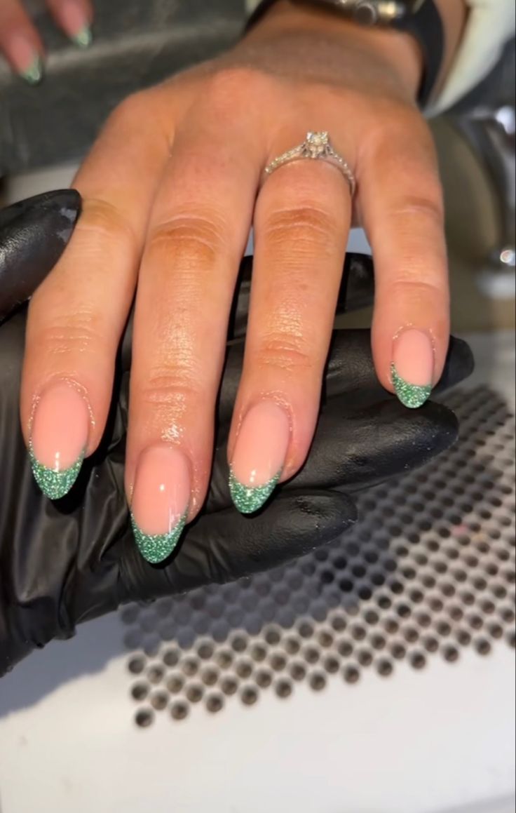 Simple Sparkly Nails Acrylic, Green Sparkle Tip Nails, Green Glitter French Tip Nails Almond, Green French Tip With Silver Line, Nail Inspo Forest Green, Dark Green Nails For Homecoming, White Nails Green Tips, Green Sparkly Tip Nails, Sparkly Dark Green French Tip Nails