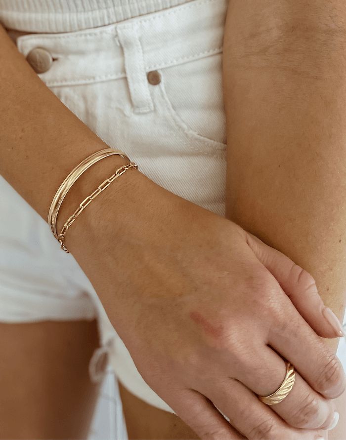 Add our bold cuff to your wrist for the ultimate power stack. Featuring a slightly domed setting with dotted edges. We consider this piece part of our 'essentials' collection. To determine your perfect fit, measure the circumference of your wrist in inches. Choose size accordingly below, bracelet is adjustable for best fit: Small ( 6 - 6.5" wrist) Medium ( 7 - 7.5" wrist) Large (8- 8.5" wrist) X-large ( 9 - 9.5" wrist) Modern Cuff Bracelets For Everyday Wear, Adjustable Stackable Chain Bangle Bracelet, Modern Cuff Bracelet For Everyday Wear, Modern Everyday Cuff Bracelets, Trendy Everyday Stackable Gold Bracelet, Stackable Bangle Bracelets For Everyday, Everyday Stackable Bangle Bracelets, Adjustable Timeless Chain Bracelet For Everyday, Timeless Adjustable Chain Bracelet For Everyday