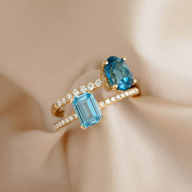 A baguette-cut swiss blue topaz gemstone paired with pavé set diamonds in the band for an extra sparkle.

This showstopper ring is a unique choice for an engagement ring or a gift for any special occasion. Set in 14k yellow gold.


Baguette-cut swiss blue topaz gemstone measures 7mm x 5mm 

Total gemstone carat weight: 1.41

18 round lab grown diamonds with a 2mm diameter  

Total diamond carat weight: 0.12

Diamond clarity: VS-SI

14k yellow gold band


 Size: 5, 6, 7, 8, 9 Topaz And Diamond Ring, Blue Topaz Gemstone, Diamond Carat, Swiss Blue Topaz, Elegant Ring, Baguette Cut, London Blue Topaz, Topaz Gemstone, London Blue