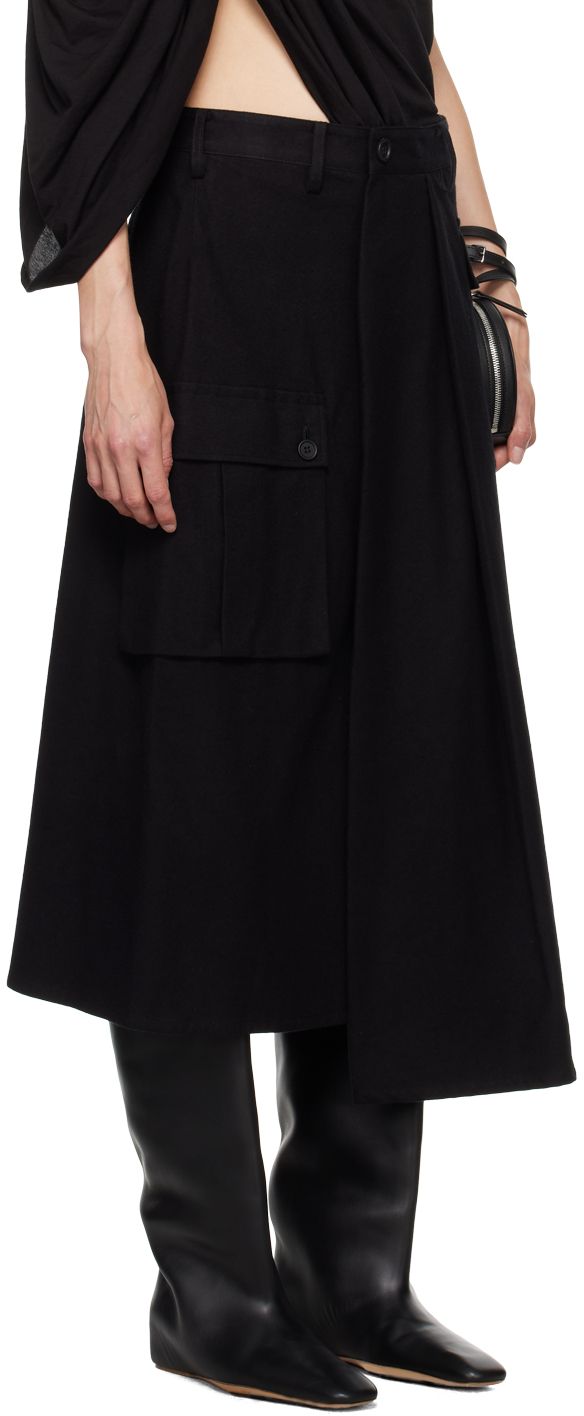 Cotton flannel skirt. · Asymmetrical construction · Belt loops · Open-fly · Pleats at front · Cargo pocket at outseams Part of the Yohji Yamamoto REGULATION collection. Supplier color: Black Fall Skirt With Pockets And Asymmetrical Hem, Flannel Skirt, Skirt Asymmetrical, Cargo Pocket, Yohji Yamamoto, Cotton Flannel, Midi Skirt, Skirt, Black