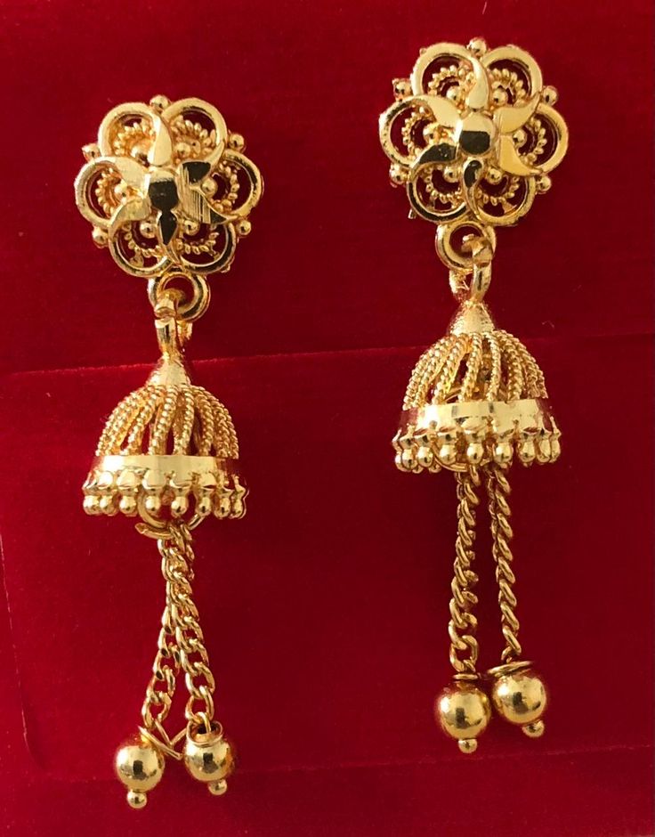 Indian dangling earrings are a traditional and iconic style of jewelry that originate from India and are popular throughout the Indian subcontinent. These earrings are known for their distinctive design, They are a significant part of Indian culture and are worn by women on various occasions, including weddings, festivals, and other celebrations. These earrings are for pierced ears.  Size:  1.5 inch long Note: these earrings are for pierced ears only Occasions: Indian earrings are versatile and can be worn on various occasions, from everyday wear to special events like weddings, festivals, and other celebrations. Care: wipe with clean dry cloth Traditional Filigree Jhumkas For Festive Occasions, Traditional 22k Gold Jhumkas, Traditional Filigree Jhumkas For Diwali, Hallmarked Drop Earrings For Ceremonial Occasions, Hallmarked Drop Earrings For Ceremonial Events, Hallmarked Ceremonial Drop Earrings, Yellow Gold Filigree Jhumkas, Ceremonial Hallmarked Drop Earrings, Chandbali Earrings With Latkans