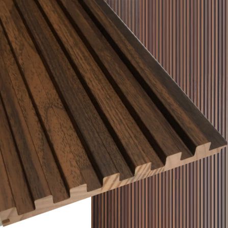 a close up view of some wood planks on the side of a window sill