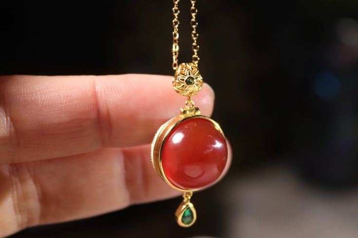 red agate enamel locket pendant necklace. the whole body is solid S925 silver. pendant size 33mm, one side set with red agate and the other side enamel. it comes with 18" gold plated silver necklace. 复��古国风烧蓝红玛瑙香囊吊坠。通体925银镀k金，整体高 33mm，配18寸银链。 Enamel Locket, Silver Locket, Locket Pendant Necklace, Stylish Bracelet, Silver Lockets, Red Agate, Whole Body, Gold Plated Silver, Pendant Necklaces