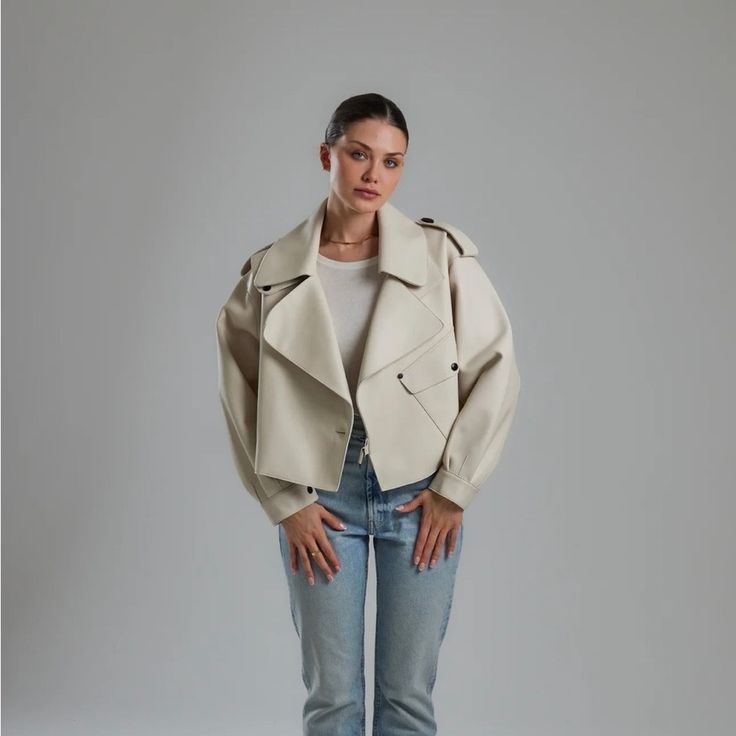 ** No Offers** I Purchased This Jacket From A Boutique In The Uk. Unfortunately It’s A Tad Too Big For Me, And The Shipping Costs Back To Uk Don’t Make It Worth Returning. It’s A Beautiful Off-White Oversized Cropped Leather Jacket That Has Slightly Puffed Sleeves With Button & Buckle Detailing. Oversized Fit And Silhouette (Allows For Layering Underneath) Outer Shell - 100% Lambskin Leather Polyester Lining Buckle Fastening Front Pocket With Decorative Button Size - Medium (Please Refer To Size Spring Biker Jacket With Lapel Collar For Work, Lapel Collar Biker Jacket For Spring Workwear, Biker Jacket With Lapel Collar For Workwear In Spring, Oversized Chic Biker Jacket For Fall, Chic Spring Leather Jacket With Lapel Collar, Oversized Biker Jacket For Workwear With Long Sleeves, Chic Leather Jacket With Lapel Collar For Spring, Oversized Long Sleeve Biker Jacket For Work, Chic Oversized Leather Jacket With Pockets