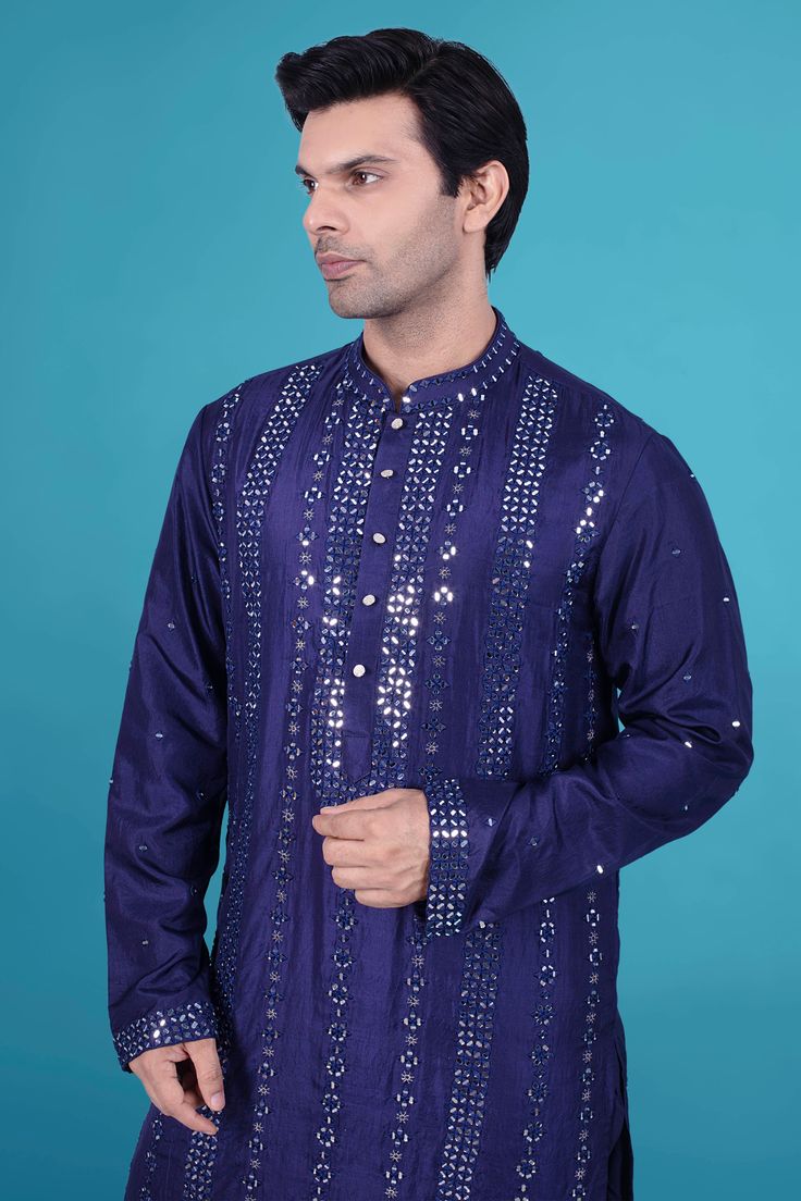 Upgrade your wardrobe with our luxurious Mens Kurta Pajama J171.N216 featuring intricate mirror work. Our premium design adds a touch of sophistication and elegance to any occasion. Elevate your style with this exclusive piece that pays homage to the world of art and fashion. Formal Kurta With Mirror Work For Festive Occasions, Formal Festive Kurta With Mirror Work, Formal Kurta With Mirror Work For Diwali, Formal Kurta With Mirror Work For Eid, Bollywood Style Formal Kurta With Mirror Work, Formal Mirror Work Kurta For Diwali, Festive Formal Kurta With Gota Work, Formal Festive Churidar With Mirror Work, Festive Designer Bandhgala With Mirror Work