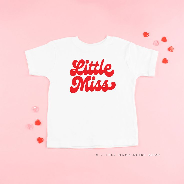 All Little Mama shirts are unisex sizing. Please reference size charts before purchasing. Red Letter Print Unisex T-shirt, Unisex Red T-shirt With Letter Print, Unisex Red Screen Print Tops, Red Letter Print T-shirt, Unisex Fit, Unisex Text Print Shirt For Summer, Summer Unisex Text Print Shirt, Cute Cotton T-shirt With Name Print, Summer Text Print Shirt, Unisex Cute Short Sleeve Shirt